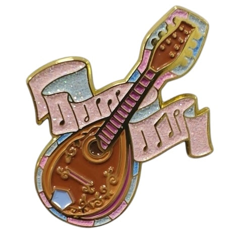 A beautiful enamel pin depicting a Bard's mandolin, complete with pink glittered musical notes representing the magic of music.