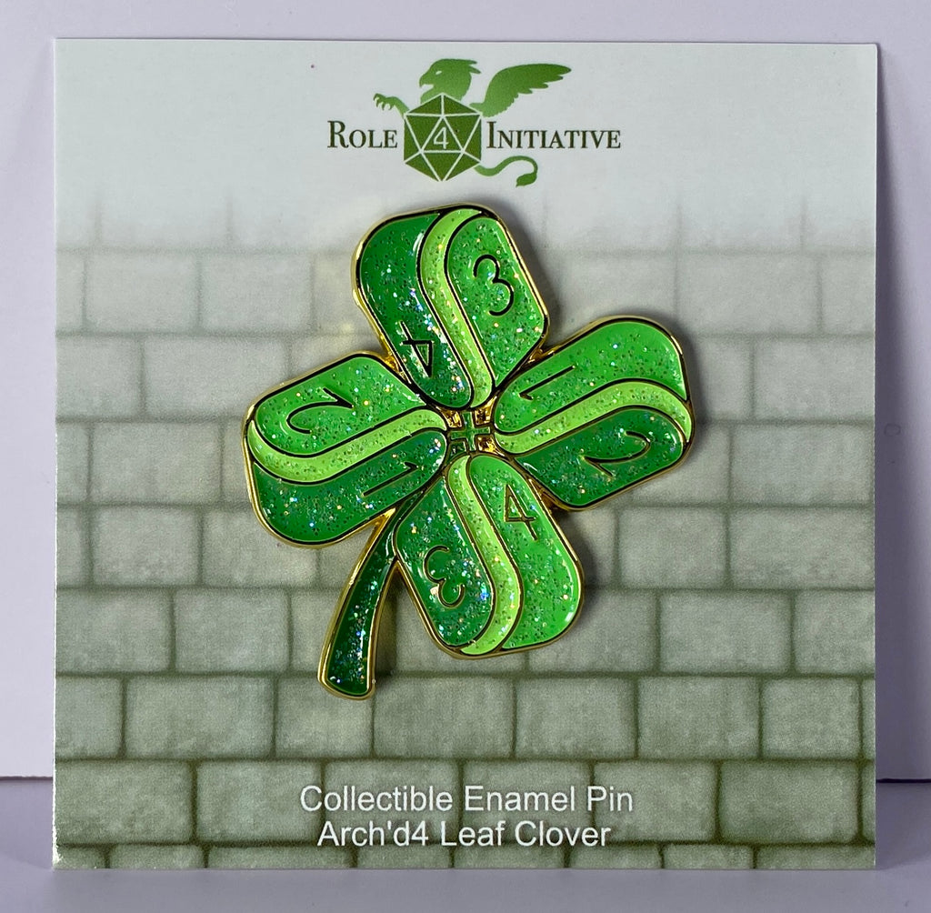 Hard enamel pin to depict a lucky 4-leaf clover made up of Arch'd4s, packaged in a polybag with backing card containing description, SKU, and UPC barcode.