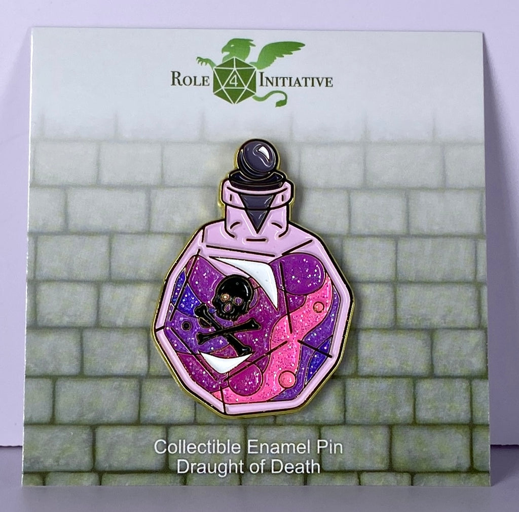 A glittering enamel pin shaped like a d12-shaped poison bottle with a black symbol of death and swirling violet and pink hues.