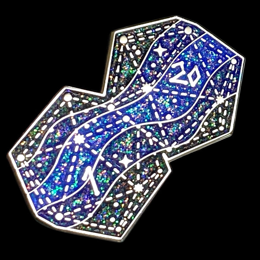 Glittery blue and silver ribbon with 'Cancer' text on a black background